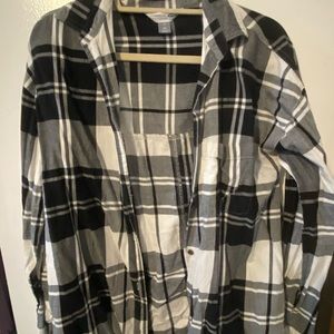 Black and white plaid button up. Size Medium tall.